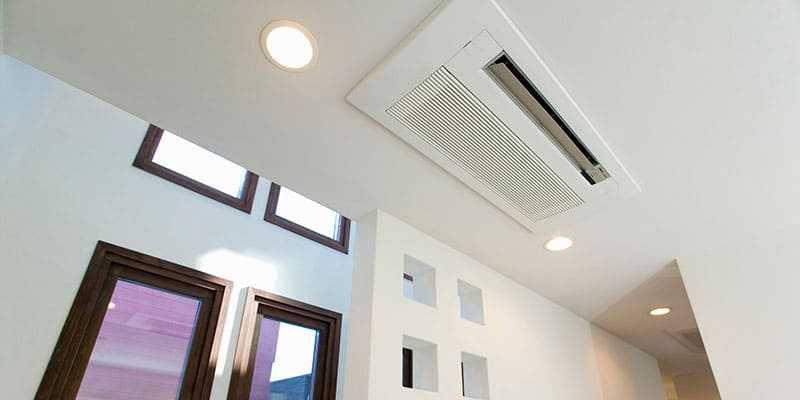 Climatisation réversible gainable installée dans une maison